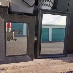 2 black leather mirrors